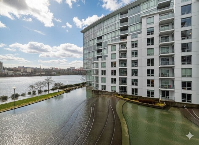Building Photo - Exquisite Condominium at the Renowned Waterfront Pearl with Views of the River, Work Out Facility...