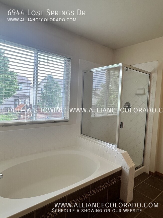 Building Photo - 6944 Lost Springs Dr