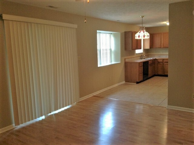 Building Photo - 6008 Tybalt Dr