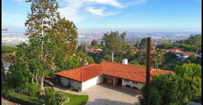 Building Photo - Resort-Style Living with Pool & Iconic Coastal Views