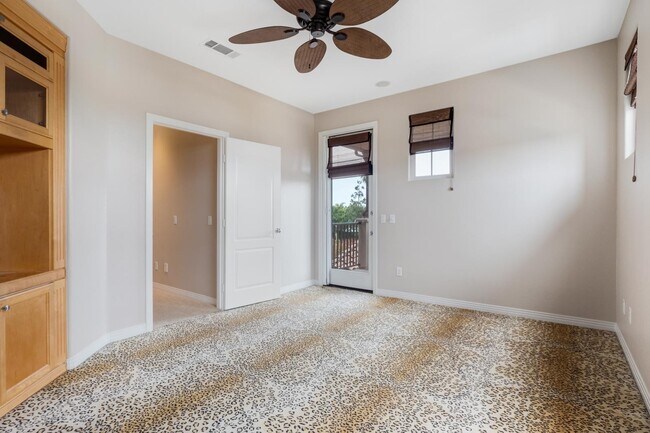 Building Photo - Gated corner lot home walking distance to the beach