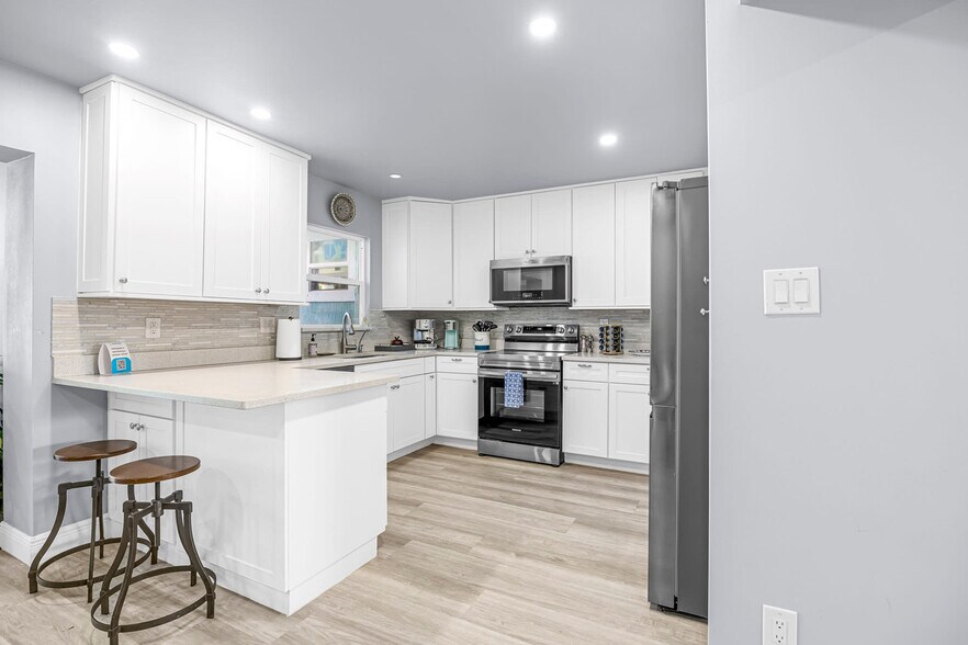 Building Photo - 6403 South Highway A1A-SI ID1044471P