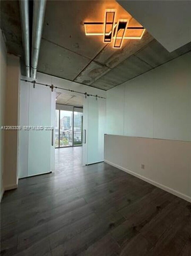 Building Photo - 690 SW 1st Ct