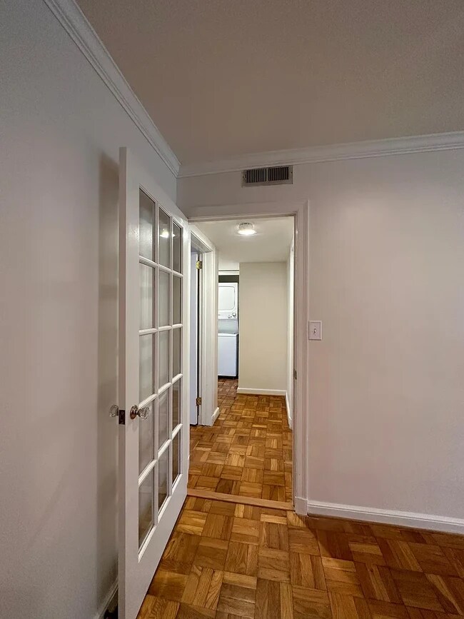 french door separating entertainment from living - 108 Colville Rd