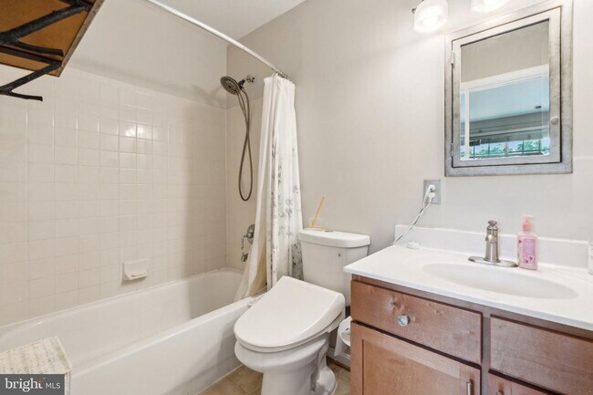 Building Photo - Welcome to this beautifully updated three ...