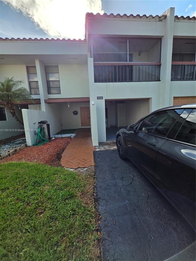 Building Photo - 6509 Racquet Club Dr