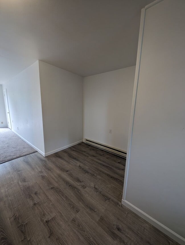 Building Photo - Cute and Cozy, Centrally Located Triplex with Yard