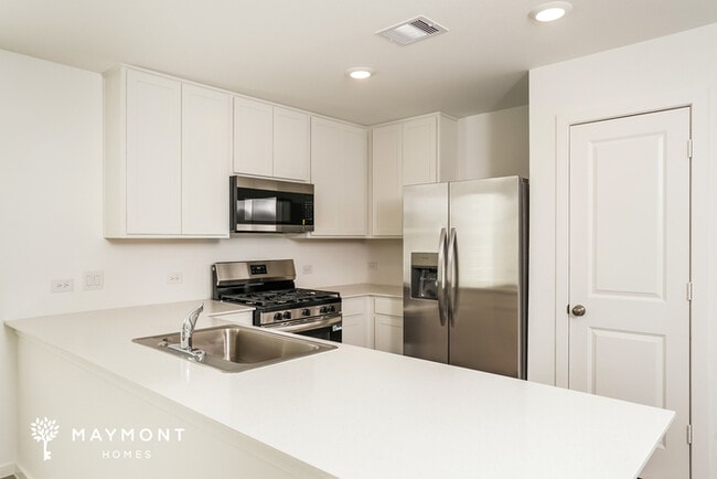 Building Photo - Live the Sunterra Lifestyle: Lagoon, Pool & More