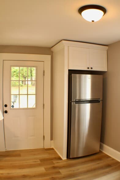 Back door in the kitchen - exit to the porch and covered deck - 311 Paris Mountain Ave