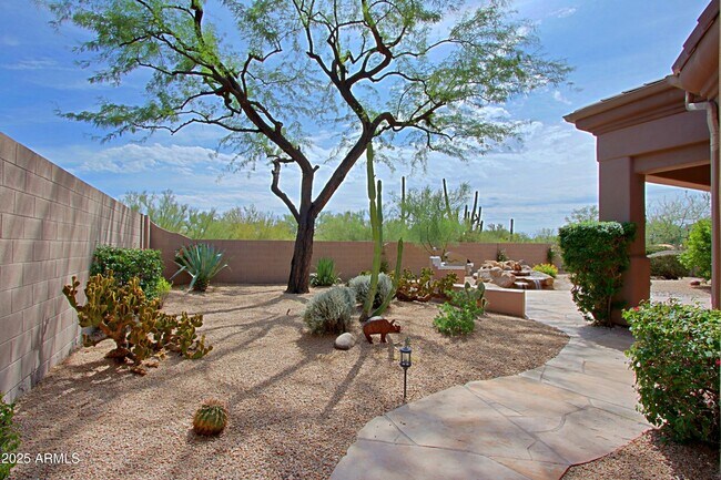 Building Photo - 6879 E Amber Sun Dr