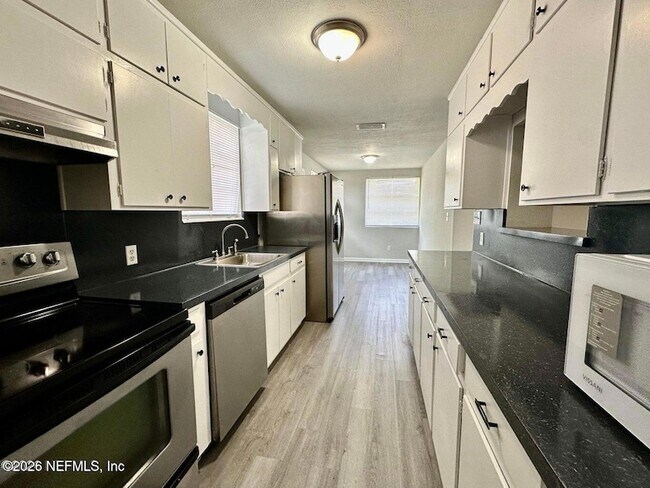 Building Photo - 5255 Camille Ave