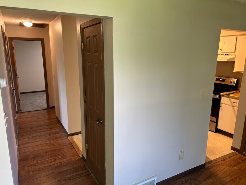 Hallway to bedrooms and bathroom - 16075 Joplin Ave