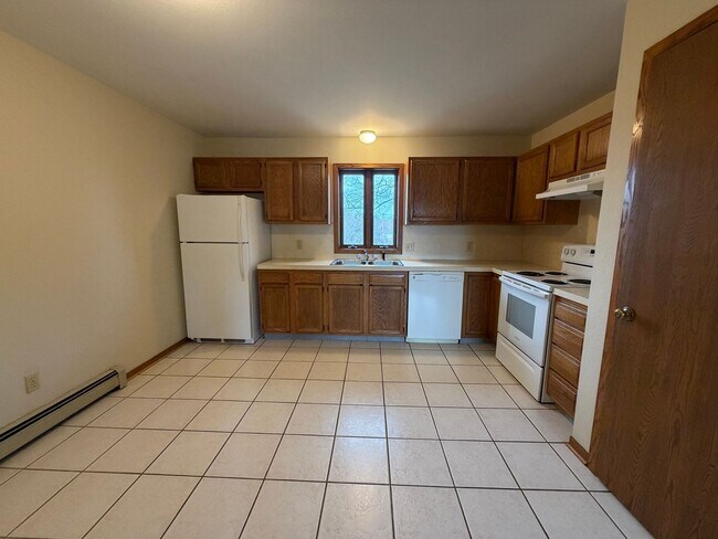 Building Photo - Two Bedroom Apartment - Upper Unit. Byron Center Schools!