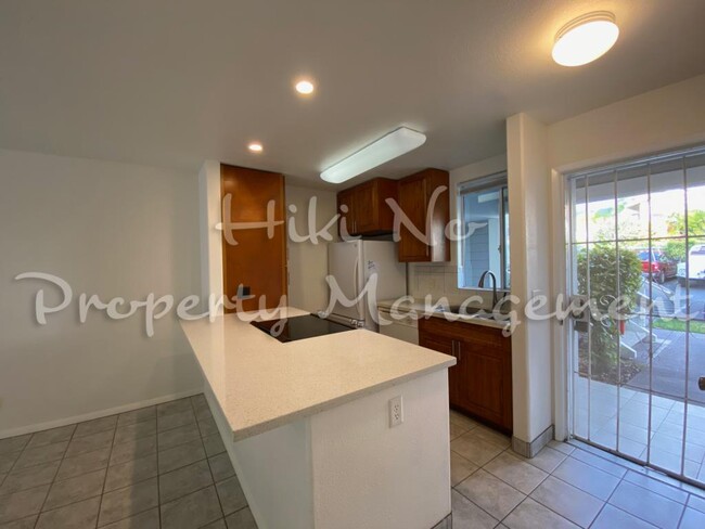 Building Photo - 75-6081 ALII DR, Apt D103