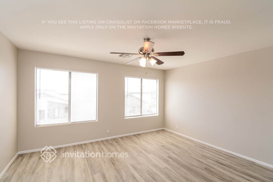 Building Photo - 8793 W Laurel Ln
