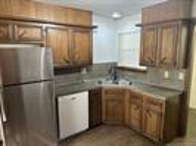 Building Photo - Welcome home to this beautifully updated 3-bedroom, 2-bath home with a 2-car garage, located in t...