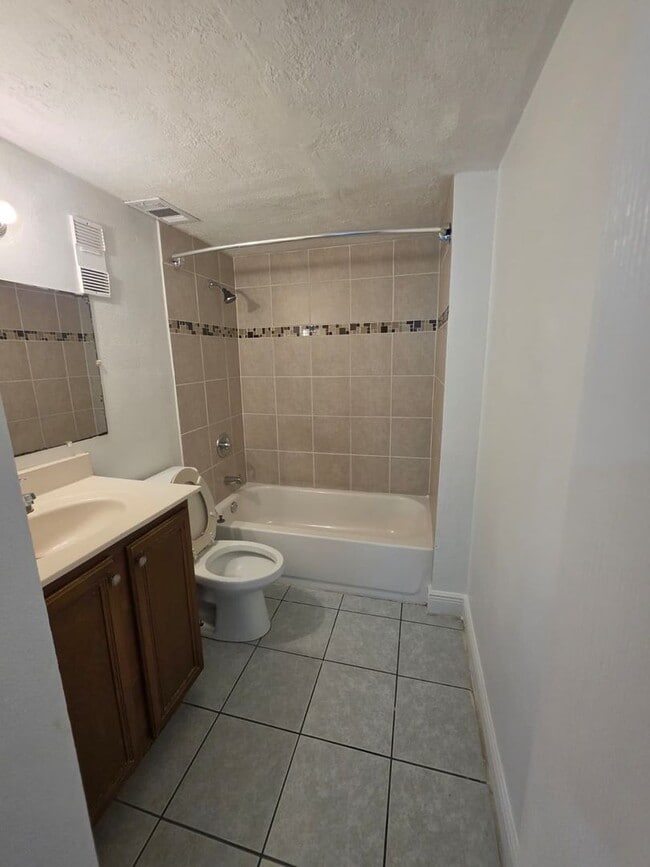 Building Photo - LAS PALMAS AT SAND LAKE CONDO