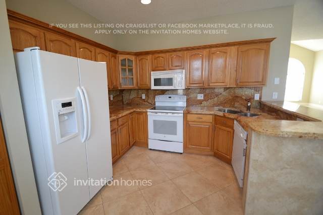 Building Photo - 7988 Lakewood Cove Ct