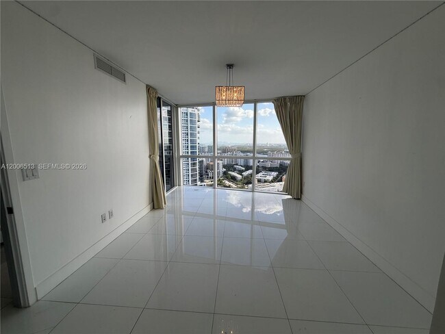 Building Photo - 18201 Collins Ave