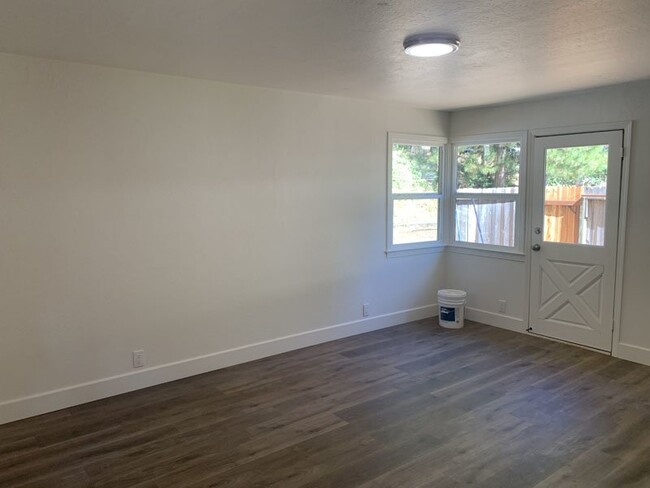 Building Photo - Recently remodeled home located behind sto...