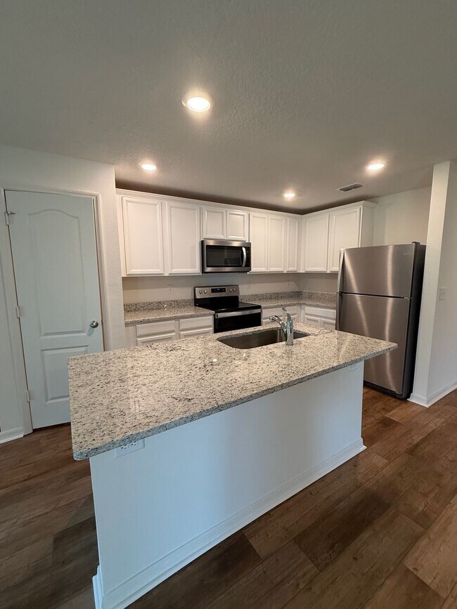 Building Photo - Stunning Brand-New 3 Bedroom+Den Home in P...
