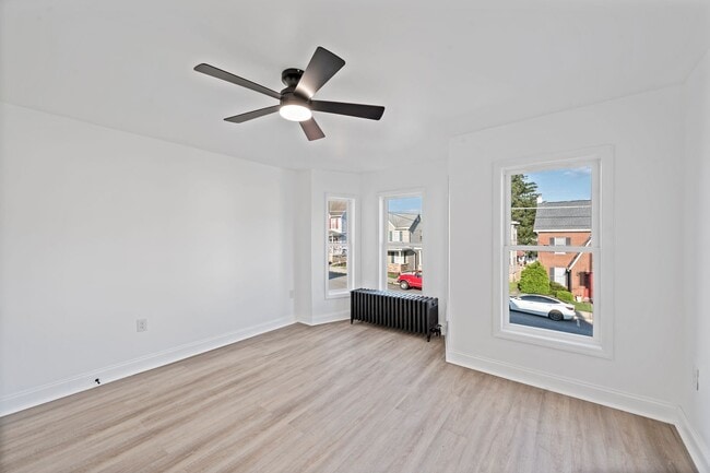 Building Photo - Newly Renovated 4-Bedroom, 2-Bath Home wit...