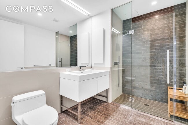 Building Photo - Elegant Condo Living with Impressive Views and Exclusive Building Amenities in the Heart of Downt...