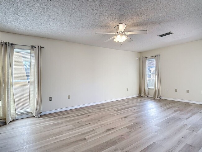 Building Photo - Spanish-Style 3 Bedroom, 2.5 Bath Mediterranean Rooftop Townhouse – Basic Cable & Wi-Fi Included!