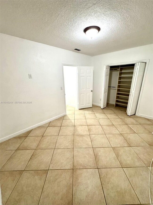 Building Photo - 6541 W 11th Ct