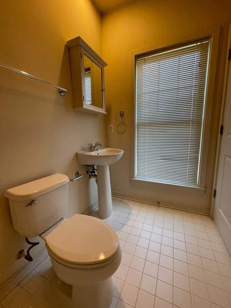 Third floor bedroom 2 bathroom with window view offering daily light - 624 Regent Pl NE