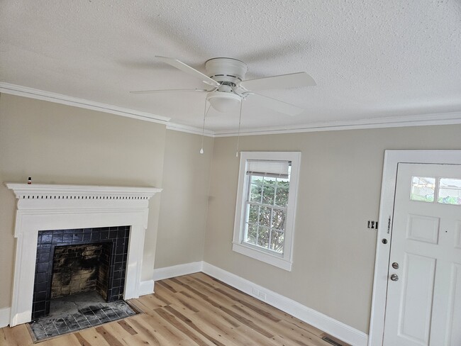 LR with new ceiling fan, new floor, freshly painted - 800 Arbor St NE