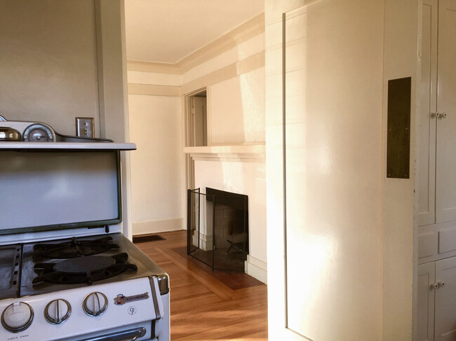 view from kitchen to fireplace - 3512 Pershing Ave