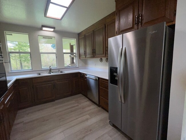 Building Photo - 1138 square feet Private Two bedroom, two bath upgraded home on 4 acres, 1 car garage, chicken co...