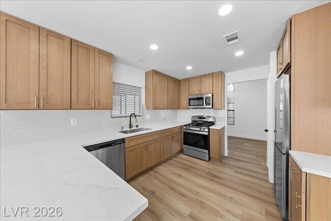 Building Photo - Beautifully 3 bedroom updated home located in the guard-gated Los Prados Golf Community!