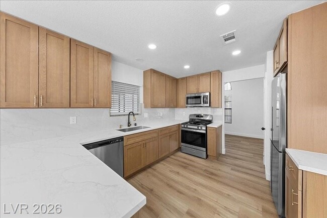 Building Photo - Modern 3Bed/2.5Bath/2Car - 2 Story Home Located In The Guard-Gated Los Prados Golf Community!