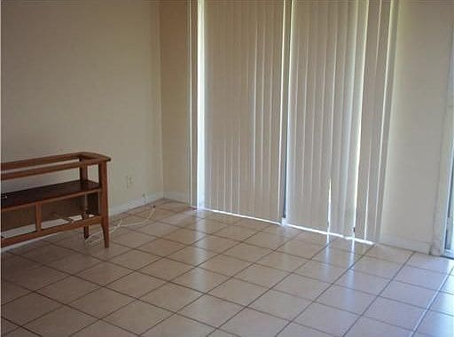 Building Photo - 11458 Royal Palm Blvd