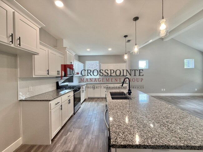 Building Photo - Spacious 4-Bedroom Home with 2.5 Bathrooms, 2-Car Garage & Fenced Yard