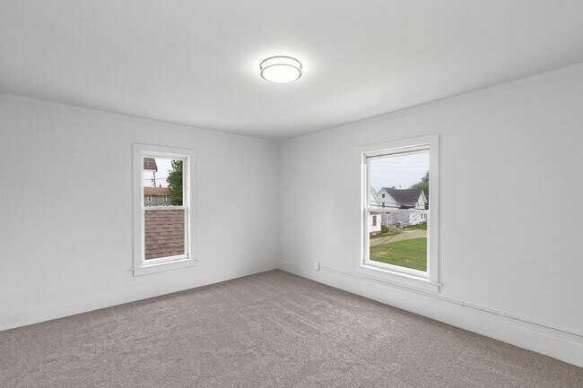 Building Photo - 2 Bed Home with Large Yard & Covered Porch – $1,295/mo