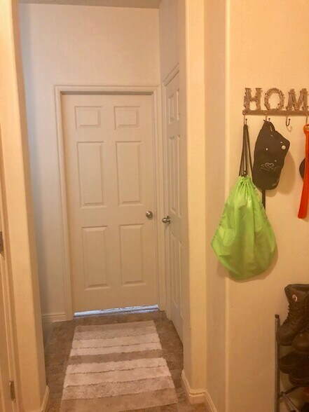 Entryway to apartment from garage. Remote, keypad, and keys to open - 11769 S Sun Tea Way