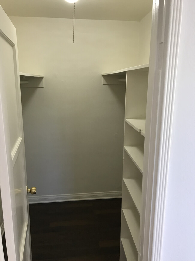 Large walk in closet with built in shelves - 2966 Hyperion Ave