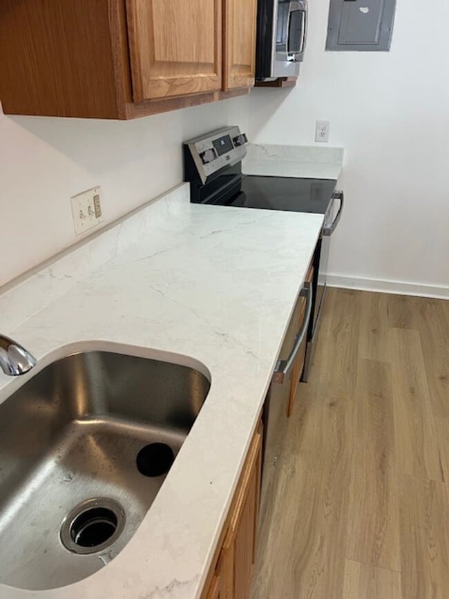 Building Photo - Pet Friendly Renovated Brookline Gem with Laundry in Unit and 1 Parking is a steal!