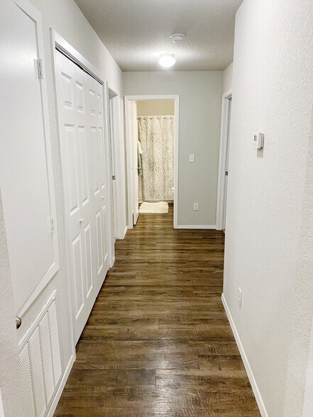 Wood look LVP flooring everywhere but the bedrooms. - 1292 S Kingfisher Ln