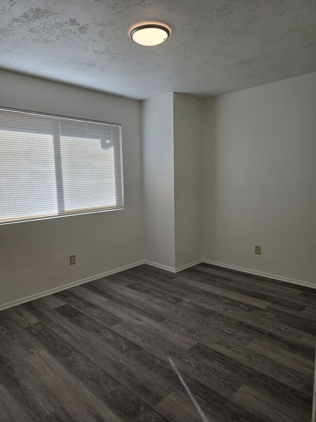 Building Photo - Two-Bedroom Condo