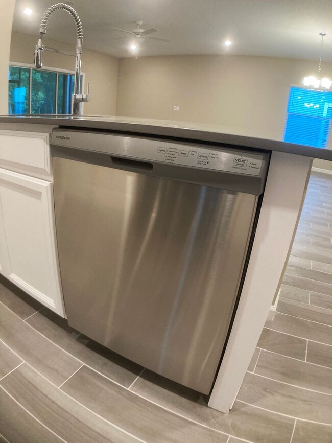Building Photo - Your Private Escape with High-End Finishes...