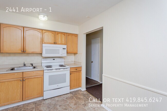 Building Photo - 2441 Airport-1