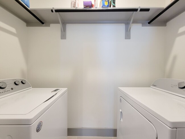 Building Photo - This 4-bedroom, 3-bathroom, two-story residence comes with a generous two-car attached garage. Re...