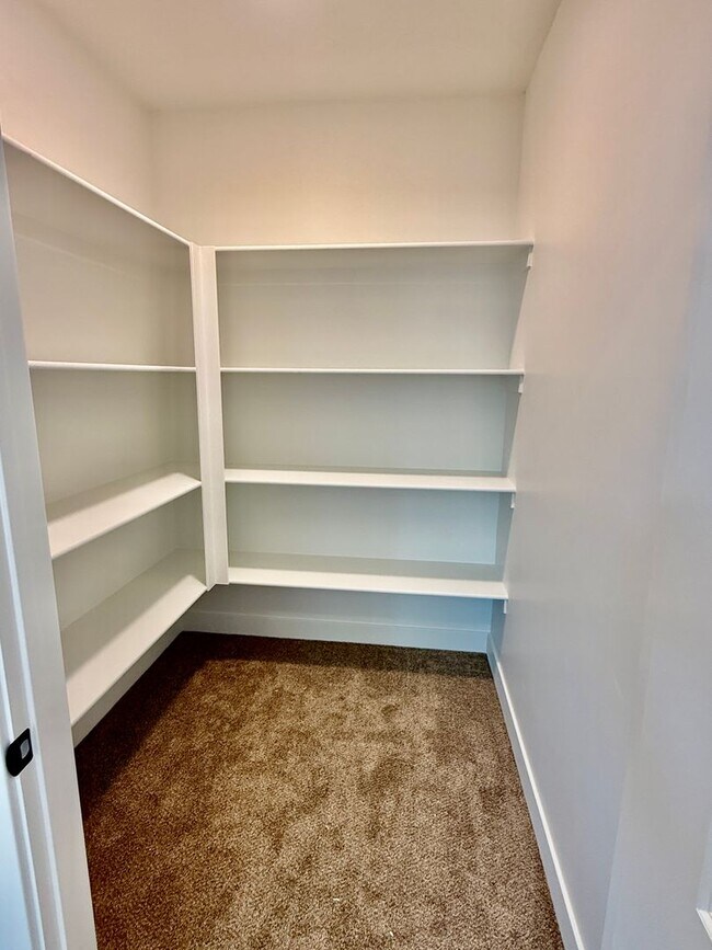 Building Photo - BRAND NEW Three Bedroom Townhome in Desert...