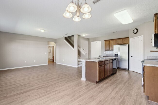 Building Photo - Spacious 5-Bedroom Home  – Prime Amelia Concourse Location!