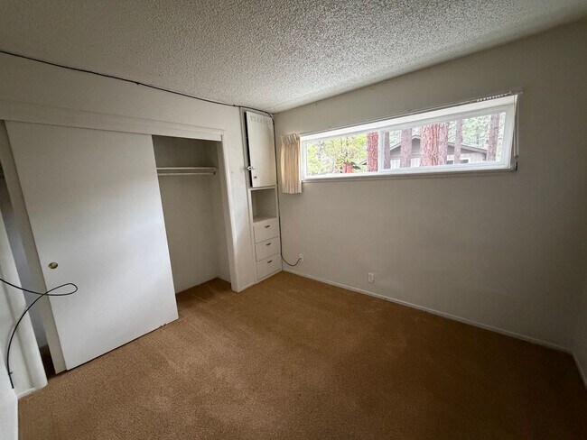 Building Photo - UNFURNISHED Upgraded Condo in Quiet Condominium Complex- New Flooring Coming Soon!