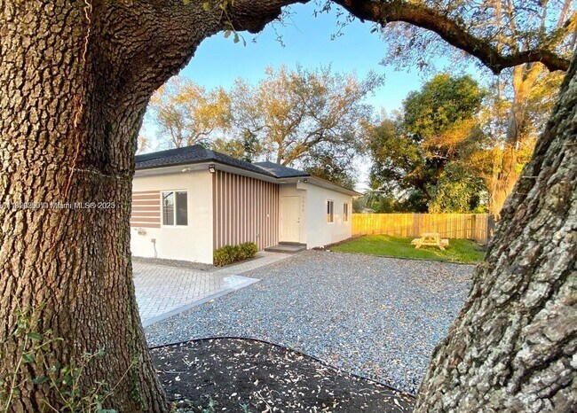 Building Photo - 9995 NW 23rd Ave